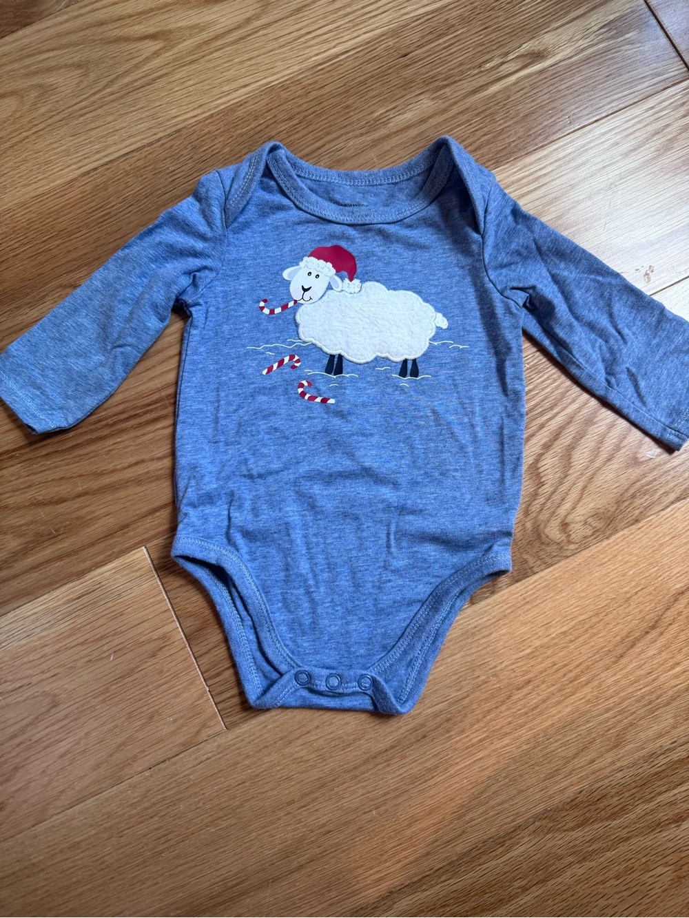 First Impressions Blue Long-Sleeve Bodysuit with White Sheep and Red Santa Hat